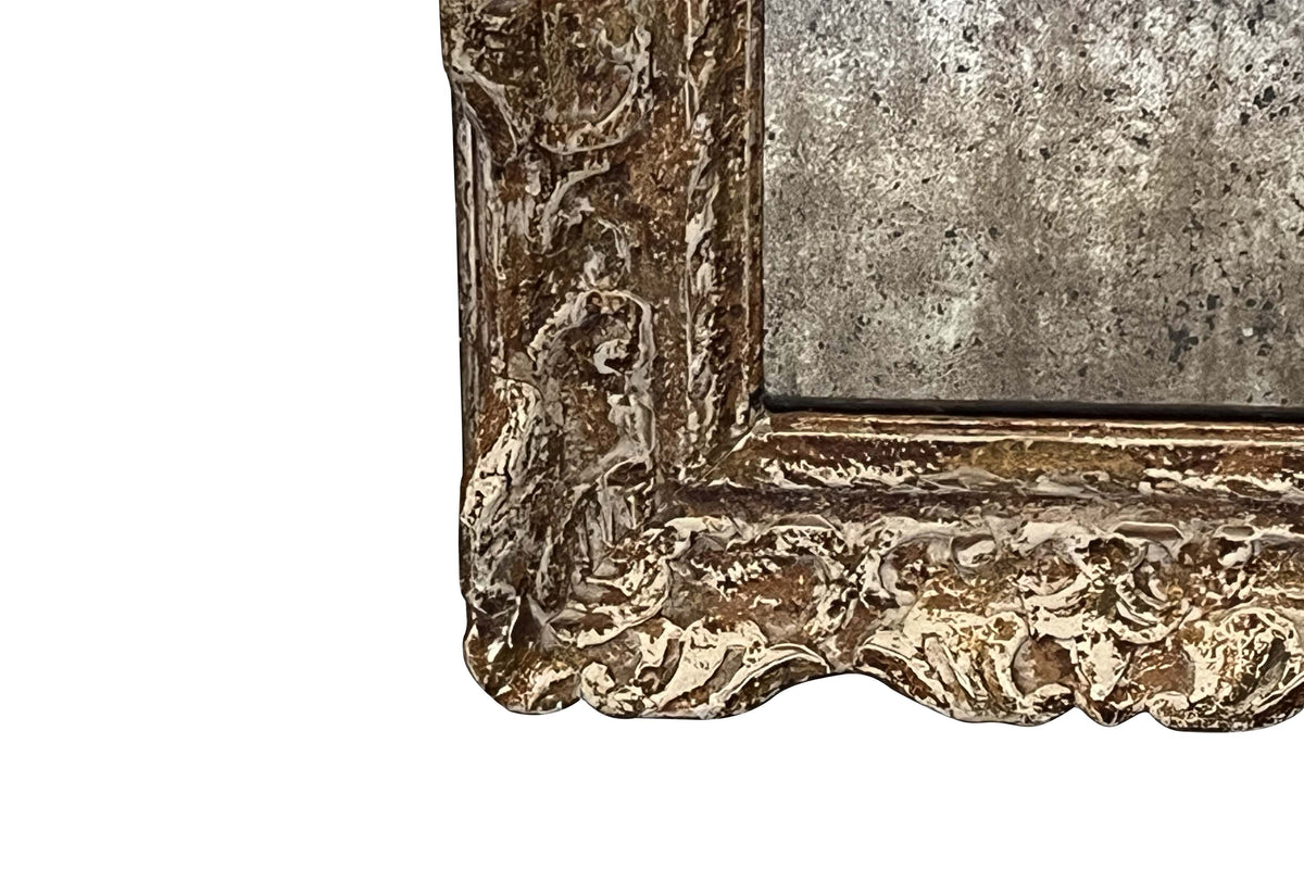 19TH CENTURY FRENCH FOXED MIRROR IN CARVED AND GILTWOOD FRAME