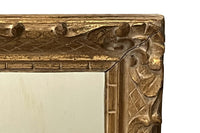 Early 20th Century French carved giltwood wall mirror of rectangular form.