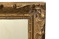 Early 20th Century French carved giltwood wall mirror of rectangular form.
