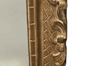 Early 20th Century French carved giltwood wall mirror of rectangular form.