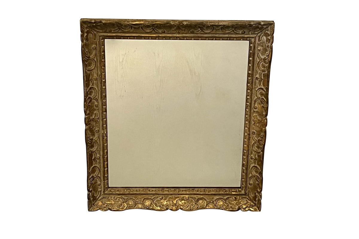 Pair of Mid-20th Century French Louis XV Style Giltwood Wall Mirrors