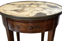 A finely proportioned early 20th Century French Louis XVI Revival bouillotte gueridon table.