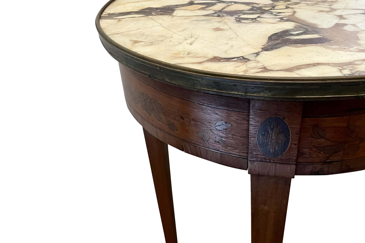 A finely proportioned early 20th Century French Louis XVI Revival bouillotte gueridon table.