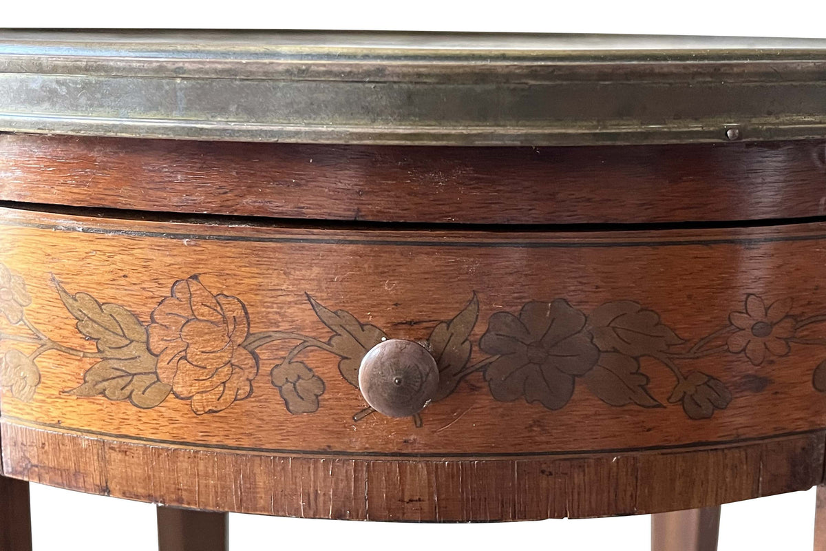 A finely proportioned early 20th Century French Louis XVI Revival bouillotte gueridon table.