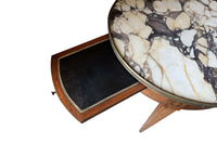 A finely proportioned early 20th Century French Louis XVI Revival bouillotte gueridon table.