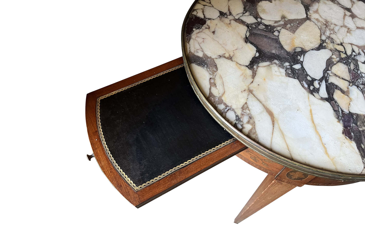 A finely proportioned early 20th Century French Louis XVI Revival bouillotte gueridon table.