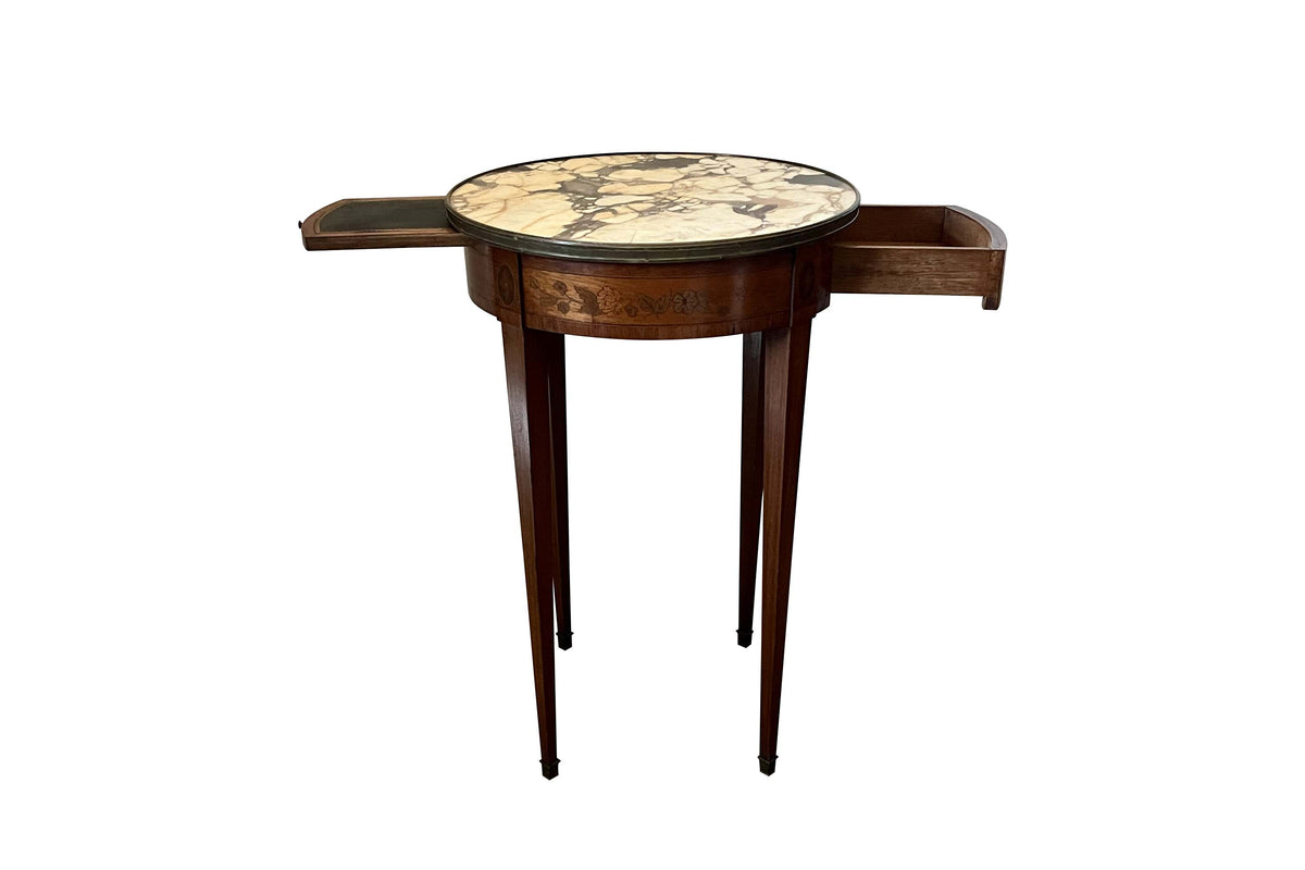 A finely proportioned early 20th Century French Louis XVI Revival bouillotte gueridon table.