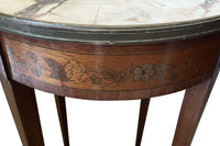 A finely proportioned early 20th Century French Louis XVI Revival bouillotte gueridon table.