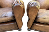 Pair of French Art Deco Moustache-Back Leather Club Chairs