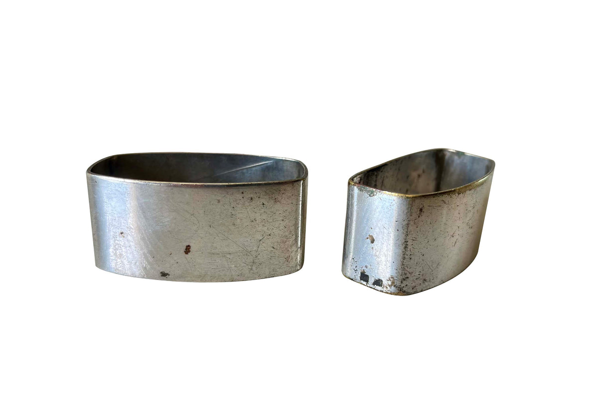 A charming pair of early 20th Century French silver-plated napkin rings engraved Madame and Monsieur. 