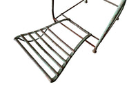 French 19th century iron garden chair with folding foot rest