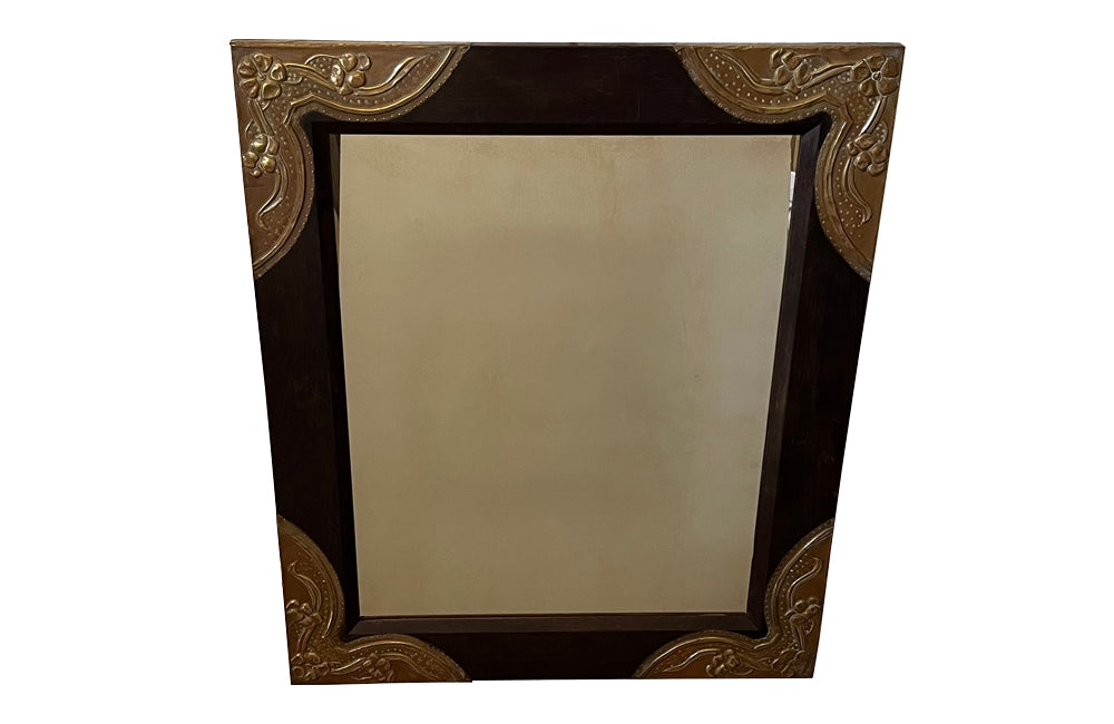 Antique mirror Aesthetic movement French with decorative repousse brass decorative corners