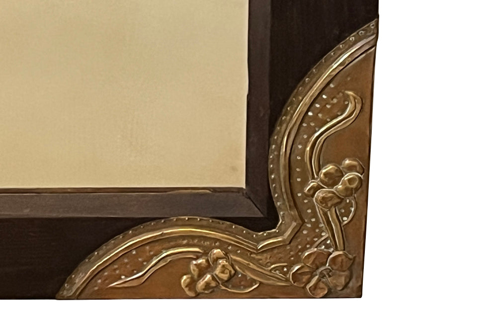 Antique mirror Aesthetic movement French with decorative repousse brass decorative corners
