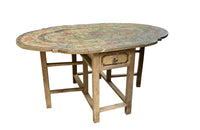 Antique table, painted, drop-leaf, Italian. hand-painted top decorated in scrolling foliate and floral motifs in warm ochre, green, lavender and terracotta tones.