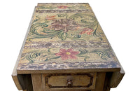 Antique table, painted, drop-leaf, Italian. hand-painted top decorated in scrolling foliate and floral motifs in warm ochre, green, lavender and terracotta tones.