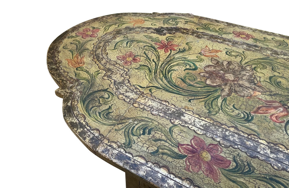 Antique table, painted, drop-leaf, Italian. hand-painted top decorated in scrolling foliate and floral motifs in warm ochre, green, lavender and terracotta tones.