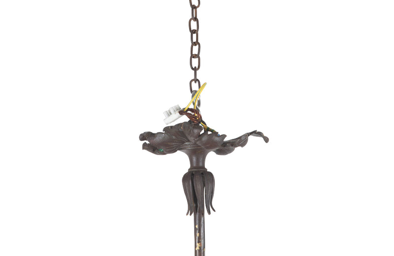 Beautiful Art Nouveau brass and tole chandelier in the form of an hanging branch ornamented with large tole roses and bird