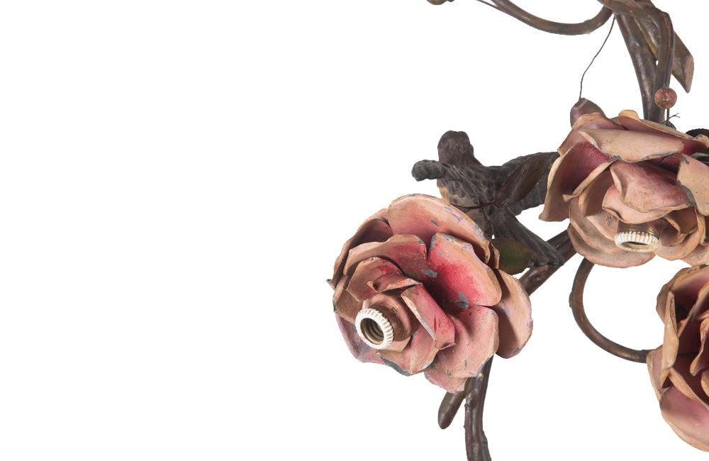 Beautiful Art Nouveau brass and tole chandelier in the form of an hanging branch ornamented with large tole roses and bird