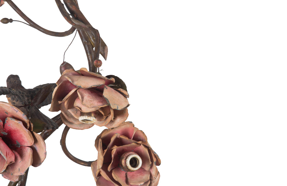 Beautiful Art Nouveau brass and tole chandelier in the form of an hanging branch ornamented with large tole roses and bird