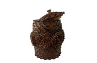 Antique Art Populaire wooden lidded jar covered in pine come flowers. French antiques.