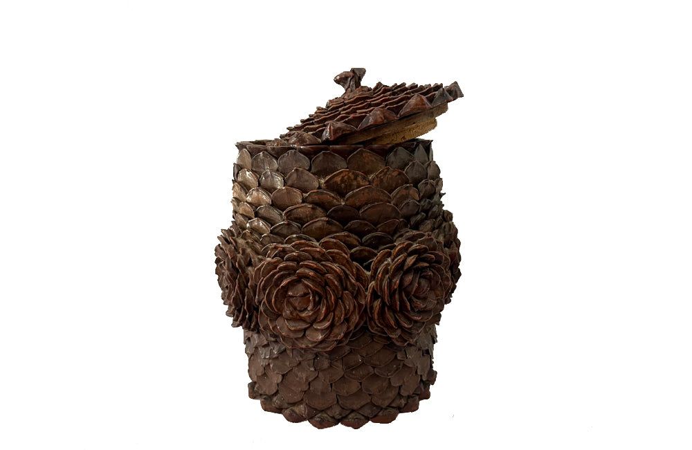 Antique Art Populaire wooden lidded jar covered in pine come flowers. French antiques.
