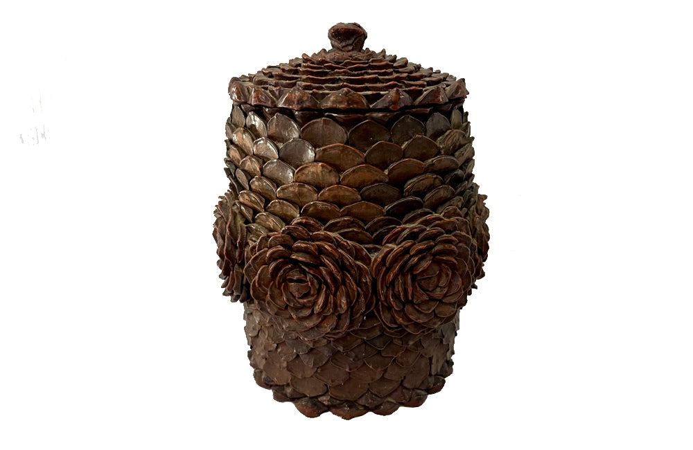 Antique Art Populaire wooden lidded jar covered in pine come flowers. French antiques.