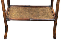 Early 20th Century French bamboo side table with two rattan shelves