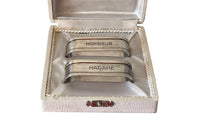 Elegant pair of silver plate napkin rings with simple engraved Madame and Monsieur lettering by Saglier Freres, Paris