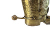 Decorative umbrella stand in the form of a large brass riding boot with brass laces to both sides, heel and spur.