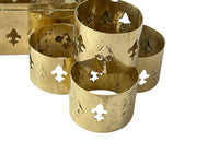 Mid-Century French lidded brass box with a set of six napkin rings