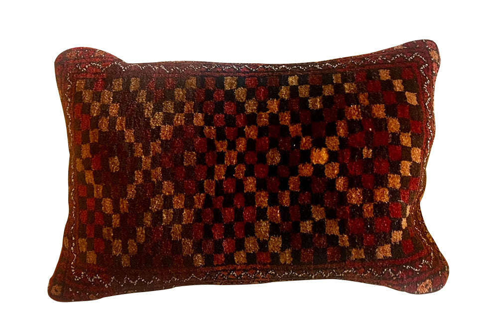 Vintage feather-filled Persian carpet cushion back with antique linen.