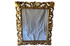 Beautiful 19th century openwork carved giltwood framed mirror in the Louis XIV style.