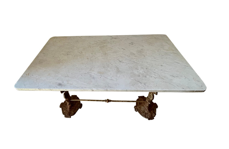 19th Century French bistro table with winged dragon supports and marble top. Great patination