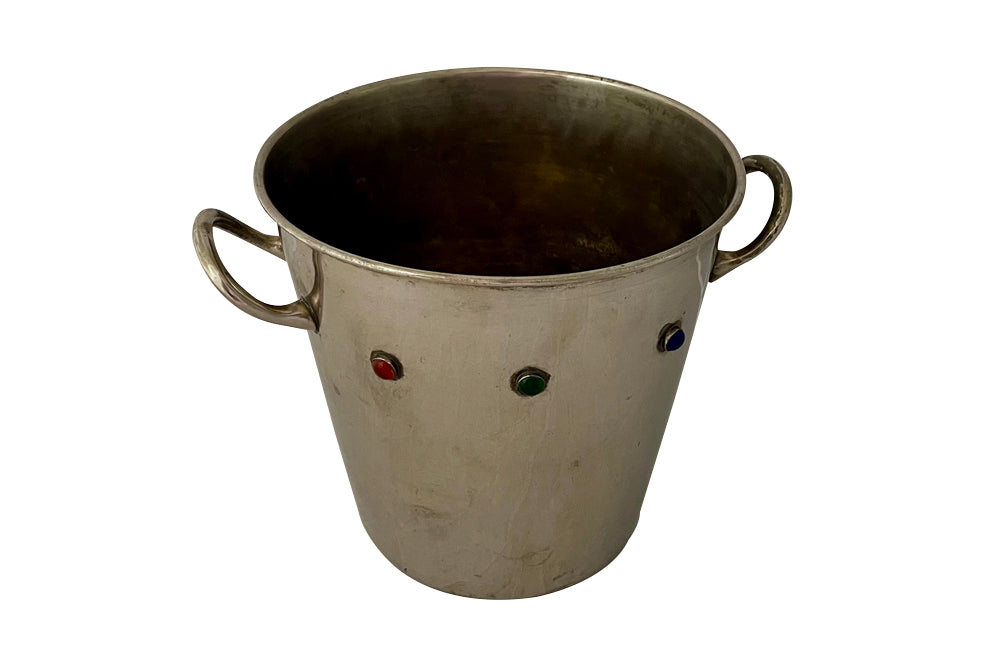 Stylish, 1970's silverplate champagne bucket decorated with six blue, red and green cabochons and two handles