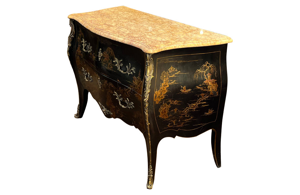 An elegant serpentine shaped, black lacquered 2 drawer commode with beautifully shaped Sienna Brocatelle marble top in the manner of Maison Jansen