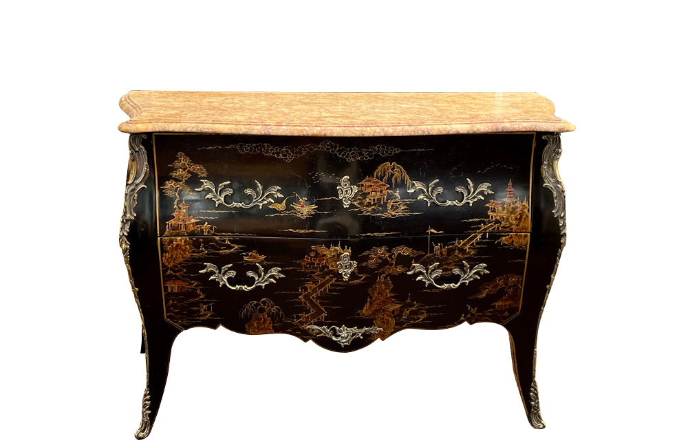 An elegant serpentine shaped, black lacquered 2 drawer commode with beautifully shaped Sienna Brocatelle marble top in the manner of Maison Jansen