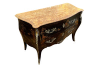 An elegant serpentine shaped, black lacquered 2 drawer commode with beautifully shaped Sienna Brocatelle marble top in the manner of Maison Jansen