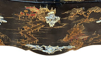 An elegant serpentine shaped, black lacquered 2 drawer commode with beautifully shaped Sienna Brocatelle marble top in the manner of Maison Jansen