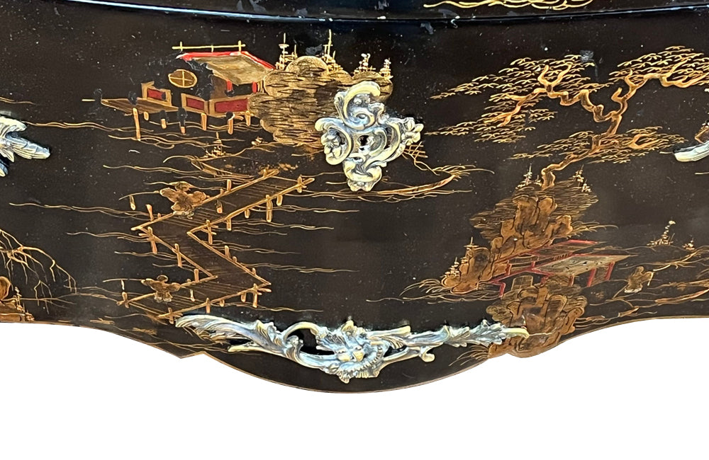 An elegant serpentine shaped, black lacquered 2 drawer commode with beautifully shaped Sienna Brocatelle marble top in the manner of Maison Jansen