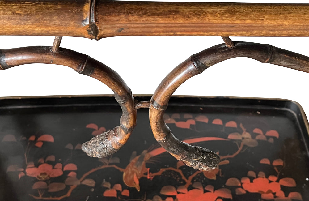 Late 19th century bamboo and lacquer side table with two integrated recessed tray shelves.