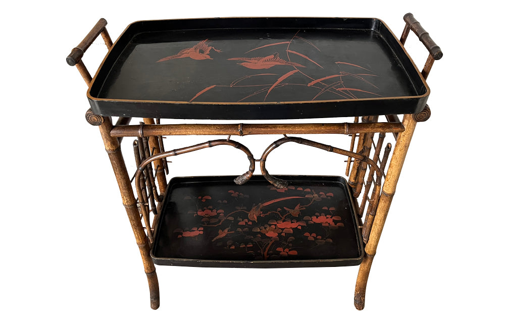 Late 19th century bamboo and lacquer side table with two integrated recessed tray shelves.