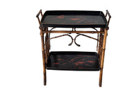 Late 19th century bamboo and lacquer side table with two integrated recessed tray shelves.