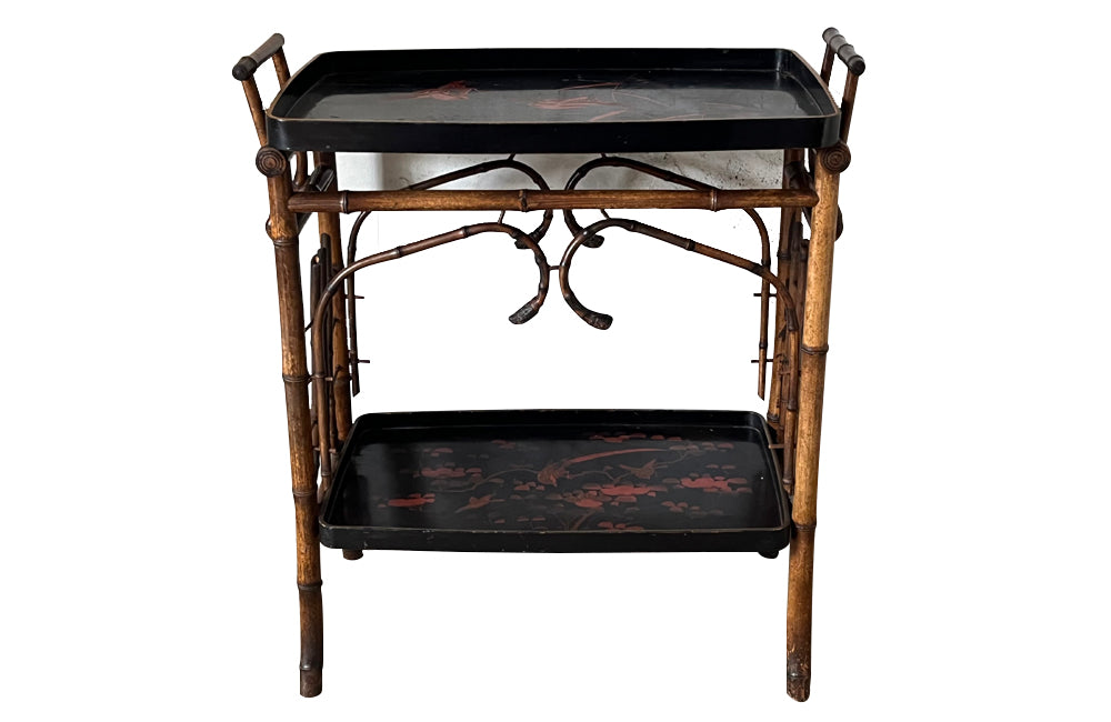 Late 19th century bamboo and lacquer side table with two integrated recessed tray shelves.