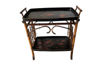 Late 19th century bamboo and lacquer side table with two integrated recessed tray shelves.