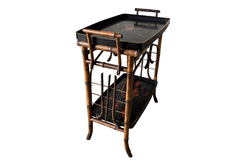 Late 19th century bamboo and lacquer side table with two integrated recessed tray shelves.