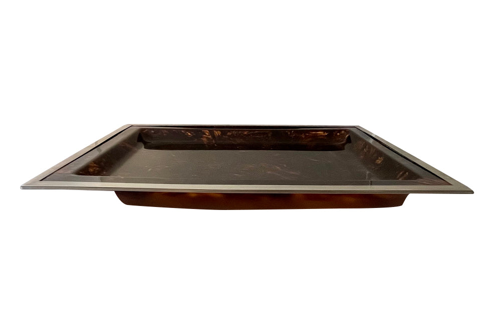 20th Century rectangular faux tortoiseshell lucite tray with chrome rim. Attributed to the Dior Home Collection.