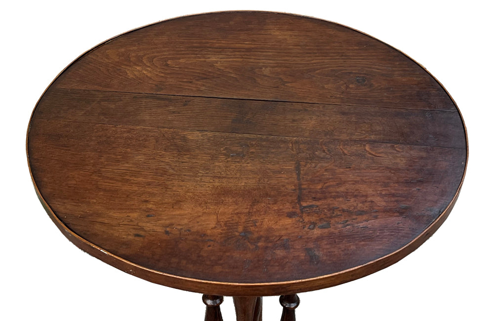 Unusual early 20th Century French oak round gueridon table.