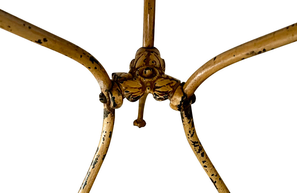 Rare, French enamel top gueridon
table with painted iron tripod base joined with central floral medaillion and
pretty enamelled top with floral motifs