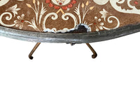 Rare, early 20th century French enamel top gueridon bistro table with iron tripod base and enamelled top featuring floral and foliate motifs.