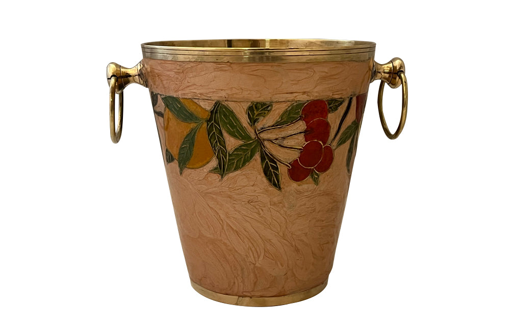 Vintage enamelled brass wine cooler with fruit themed decorative band and brass ringed handles. 